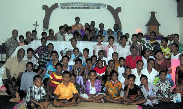 Gathered at the altar cloth