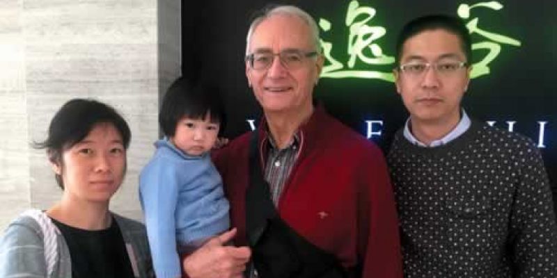 Fr. Warren Kinne with Vincent, his wife and daughter